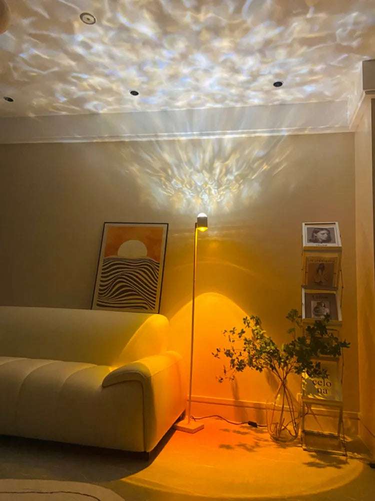 Sunset red modern floor lamp projecting water wave light pattern on floor in a living room.