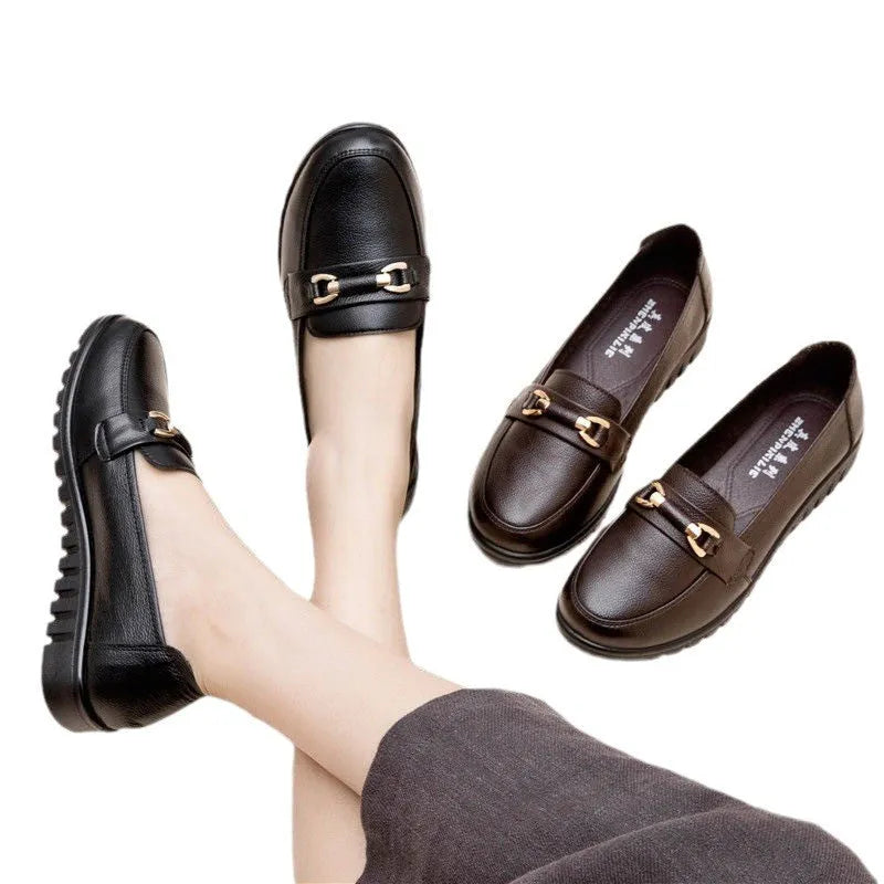 Black microfiber casual pumps with a round toe and low flat heel
