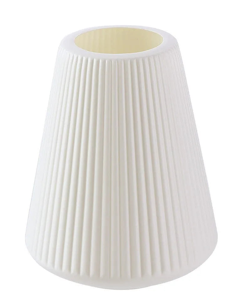 Melamine plastic decorative flower vase in blue colour on desktop