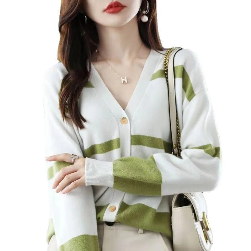 Women's striped V-neck knitted cardigan with 3D pattern in slim fit silhouette
