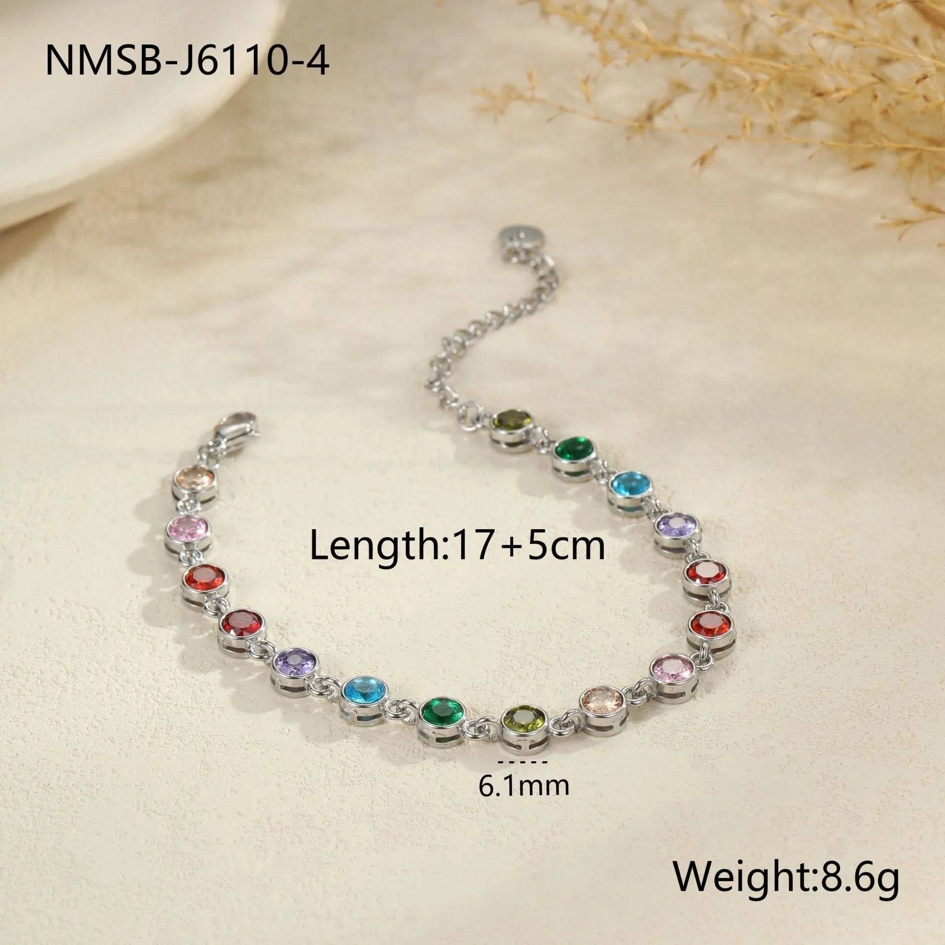 Gold and silver electroplated stainless steel bracelet with square, heart, and round geometric designs