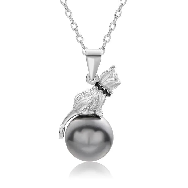 Close-up of a sterling silver cat pendant on a chain, showing the D2113 or D2114 finish variant.