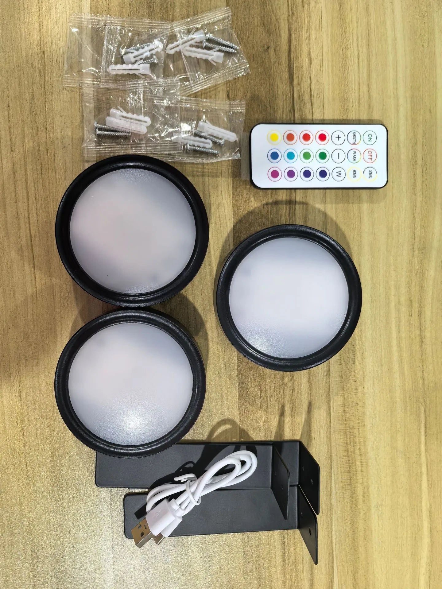Wireless LED painting lamp with magnetic charging and remote control in black, white or gold finish