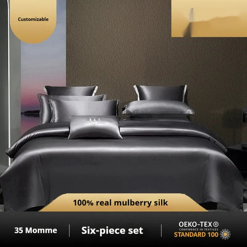 Solid colour silk quilt cover set on a bed in champagne gold, showing flat sheet and pillowcases.