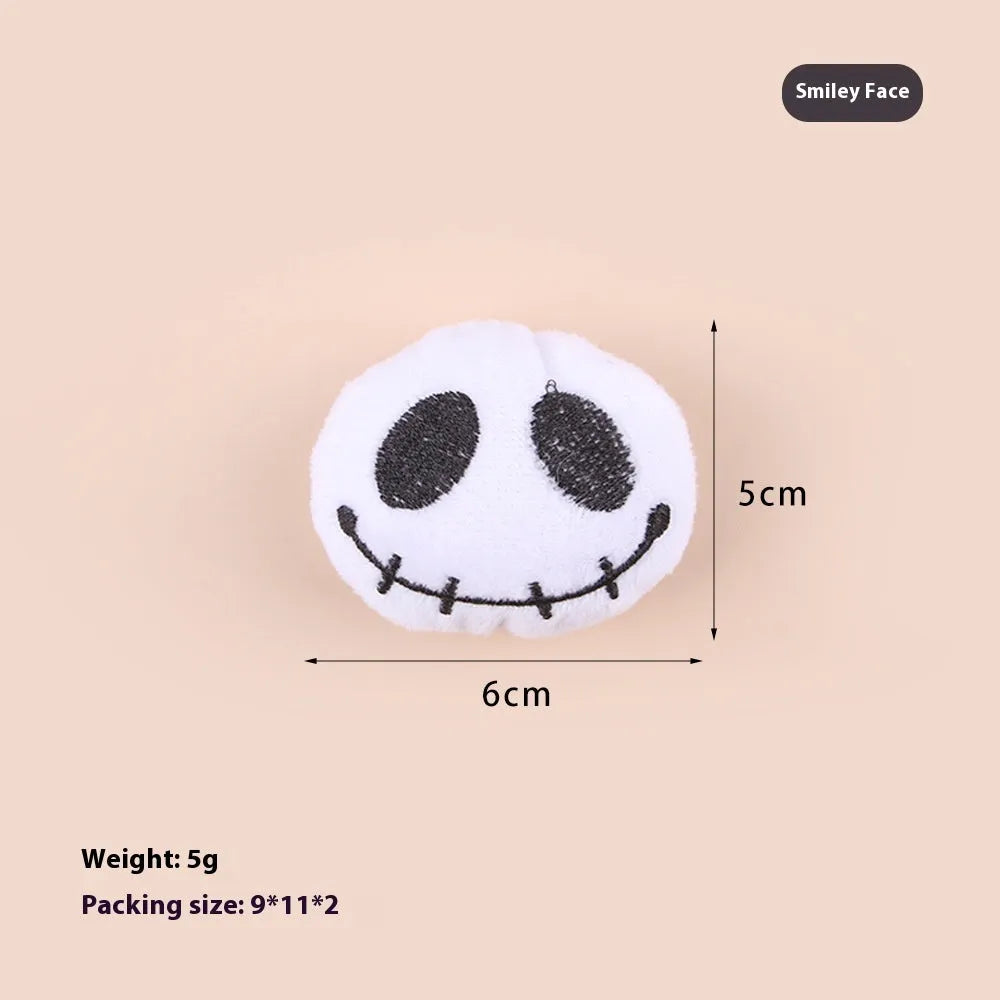 Colourful plush cat teaser wand with candy, eyes and skull animal shapes for interactive play