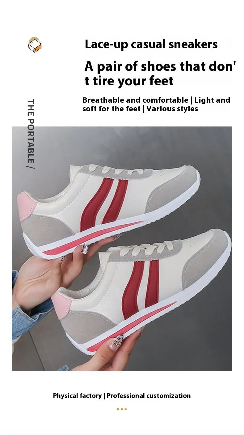 Red and blue low-top lace-up casual sneakers with a round toe and rubber sole.