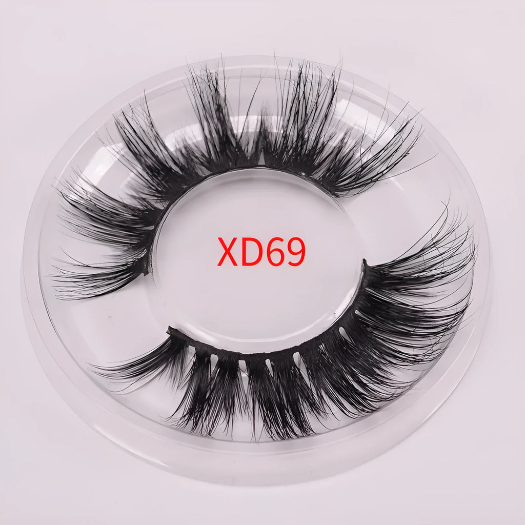 5D mink false eyelashes set with brush and storage cap on pink background