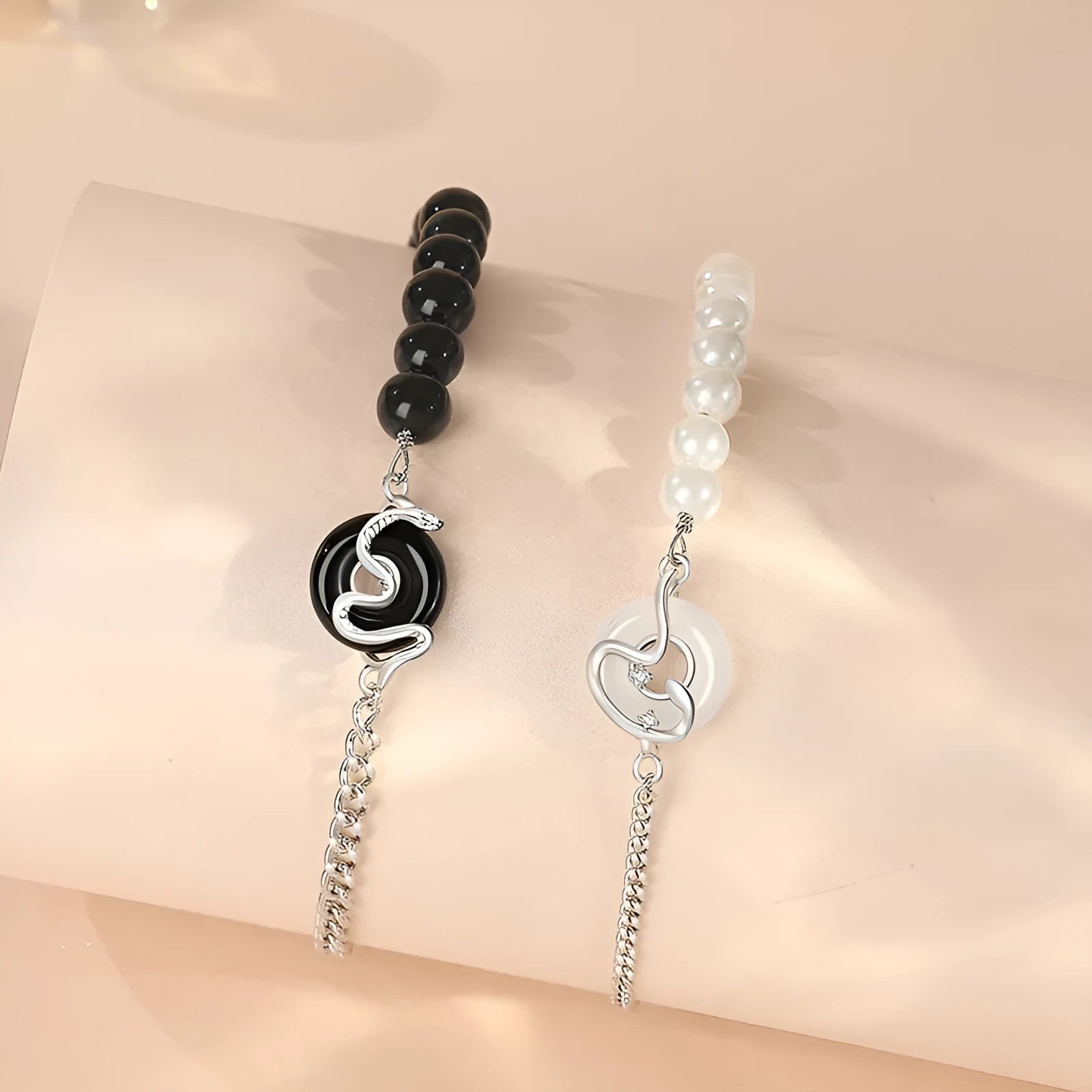 New Chinese style snake zodiac bracelet in 925 sterling silver with a peace buckle clasp, shown in male and female variants.