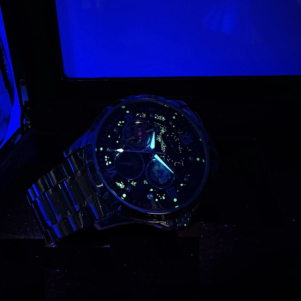 Men's automatic mechanical chronograph watch with rose gold case, black dial, and stainless steel bracelet