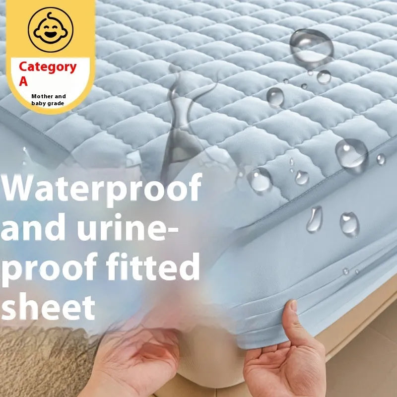 Blue washed cotton waterproof fitted sheet with elasticated corners shown on mattress