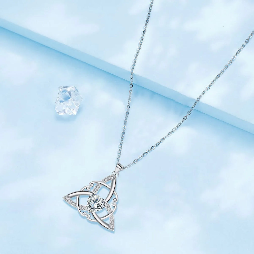 Copper Celtic knot necklace for women with geometric pendant in electroplated blue colour.