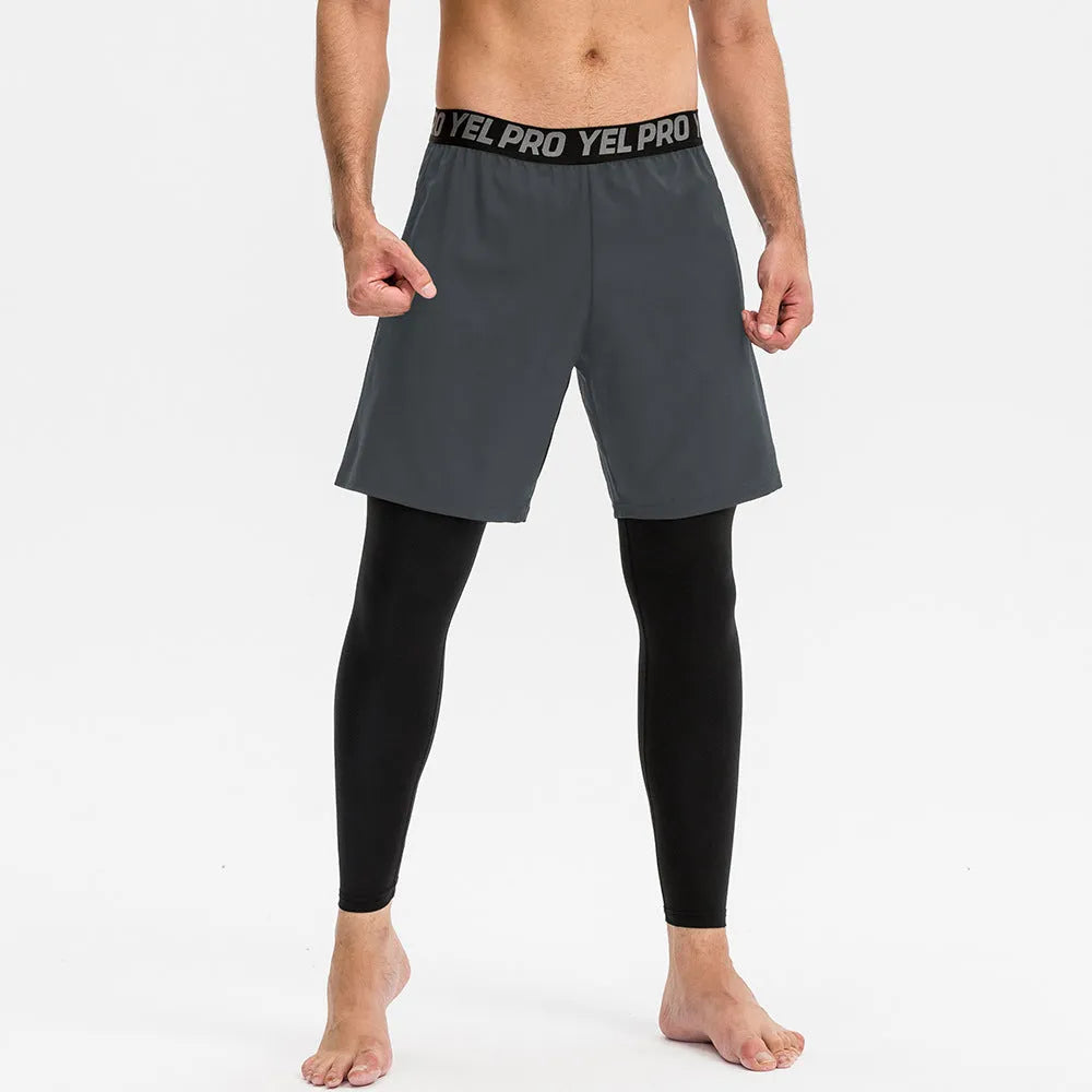 Man wearing grey elastic quick-drying sports trousers for fitness exercise.