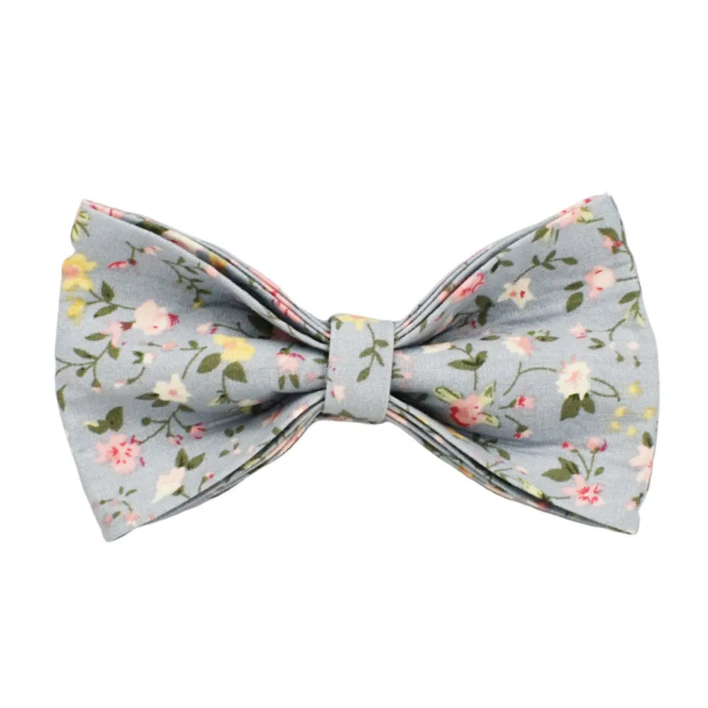 Blue floral polyester cotton dog collar and matching leash set with bow, vest, and poop bag accessories