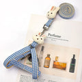Quick release anti-pull nylon harness and leash for a small dog in blue.
