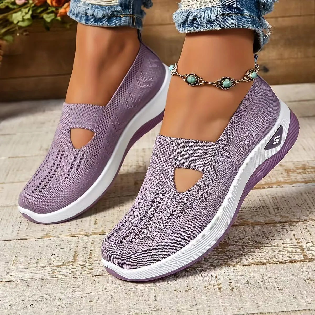 Women's casual mesh shoes with T-strap design and soft PVC soles in light purple colour