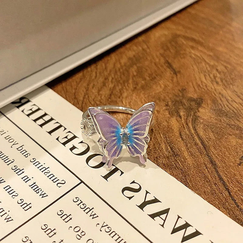 Copper women's ring featuring a creative Chinese butterfly design, available in multiple colours.