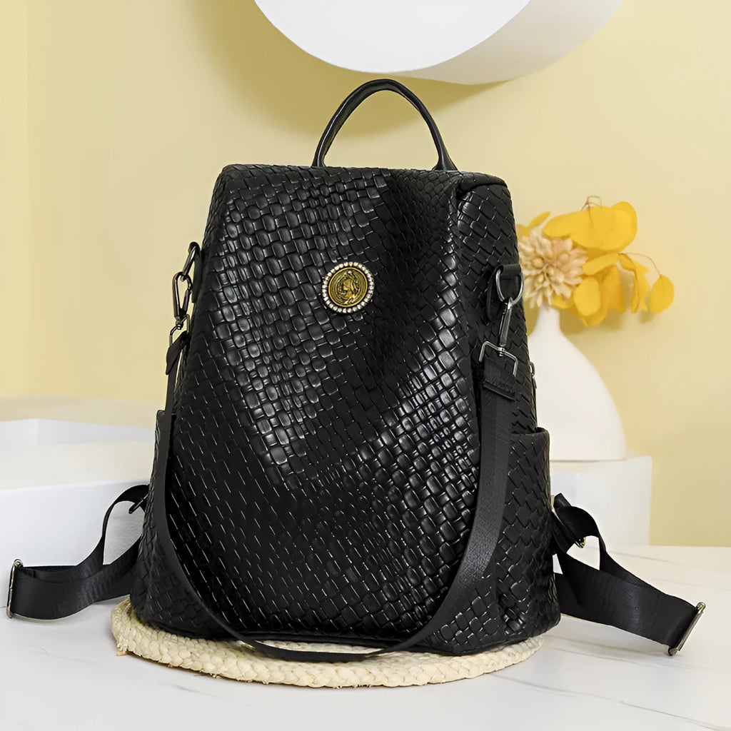 Women's black PU anti-theft backpack with waterproof function and organised internal compartments
