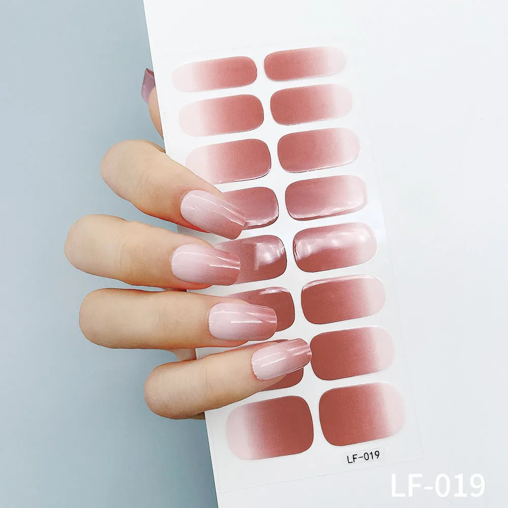 Sheet of 16 solid colour nail art sticker designs including cross, rose, and leopard print patterns.