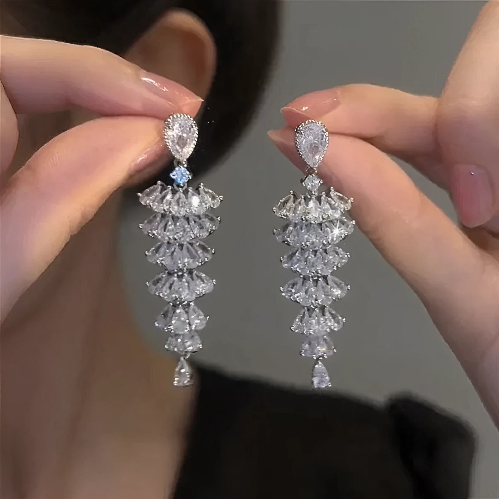 Silver pagoda colour Christmas tree drop earrings with sparkling zircon details on copper studs.