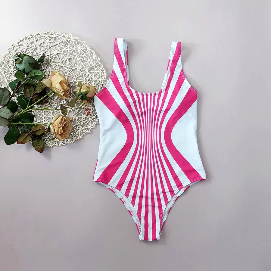 Women's pink striped one-piece swimsuit with digital print on front and back.