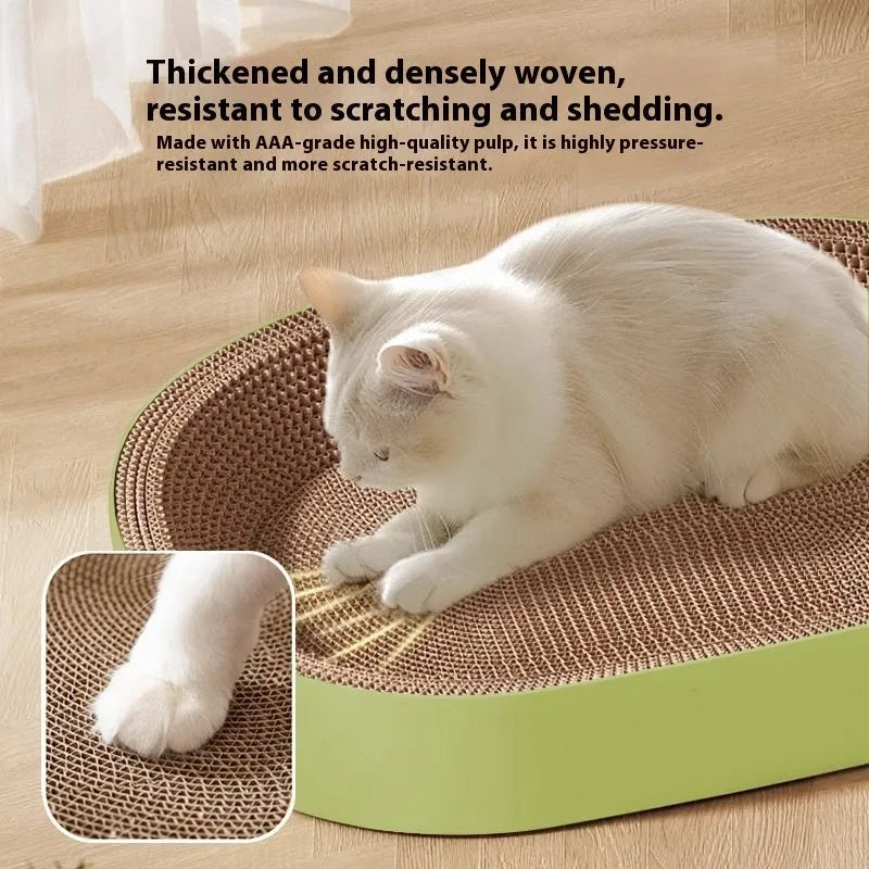 Large green oval cat scratch board and nest made from corrugated paper