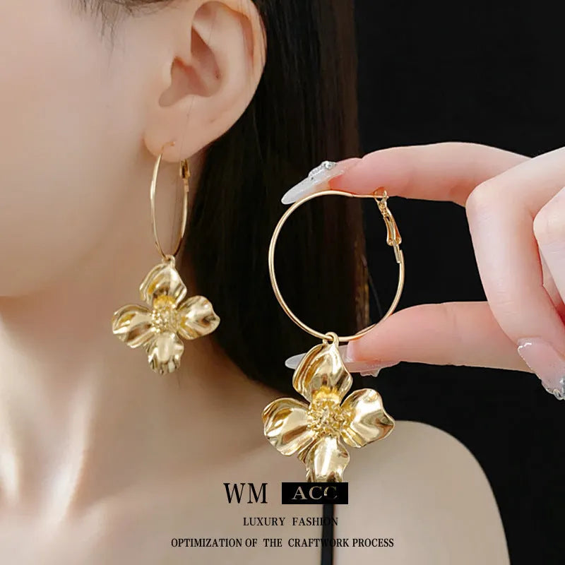 Silver Needle metal flower earrings in geometric design with electroplated gold or silver finish