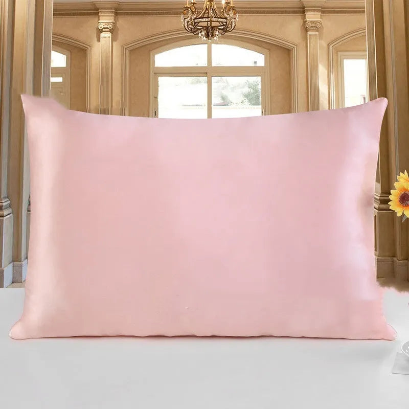 19 M double-sided silk pillowcase in apricot colour showing smooth texture and hem detail.