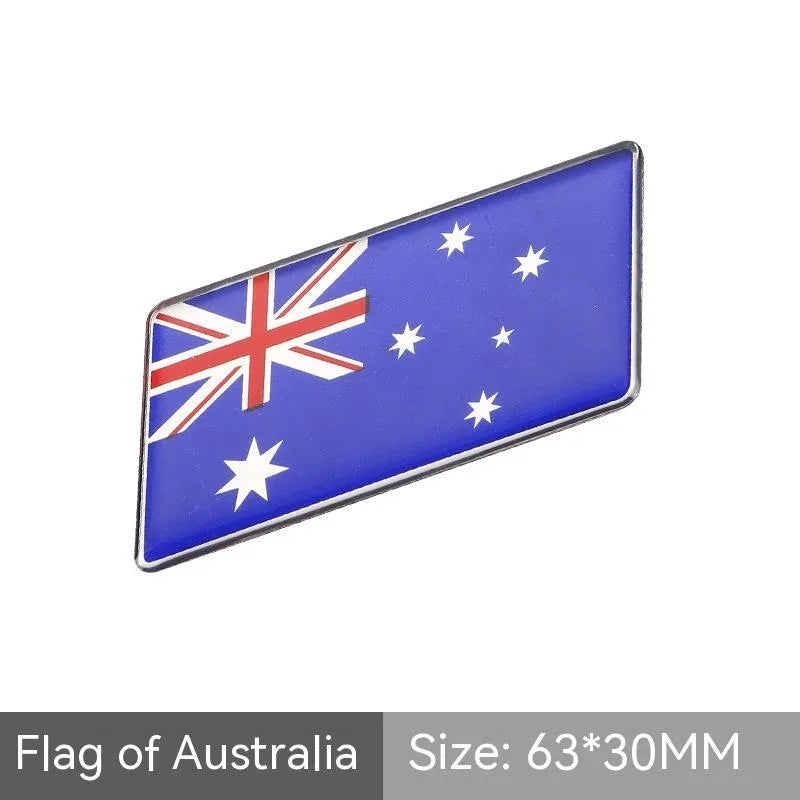 Aluminium parallelogram car sticker with national flag design measuring 6.3 by 3 cm