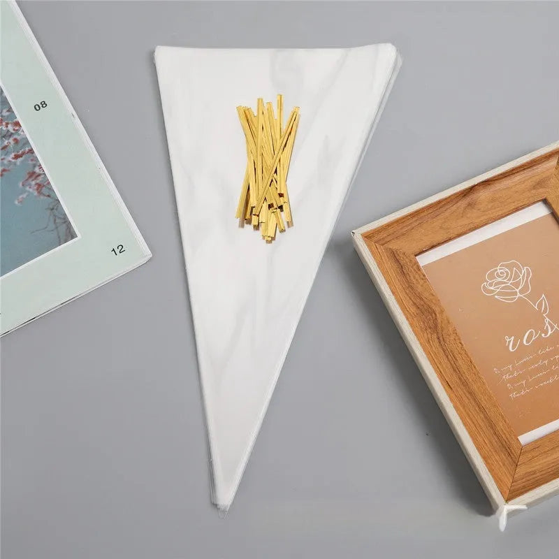Triangle-shaped clear plastic packaging bag with a metallic tie wire closure.