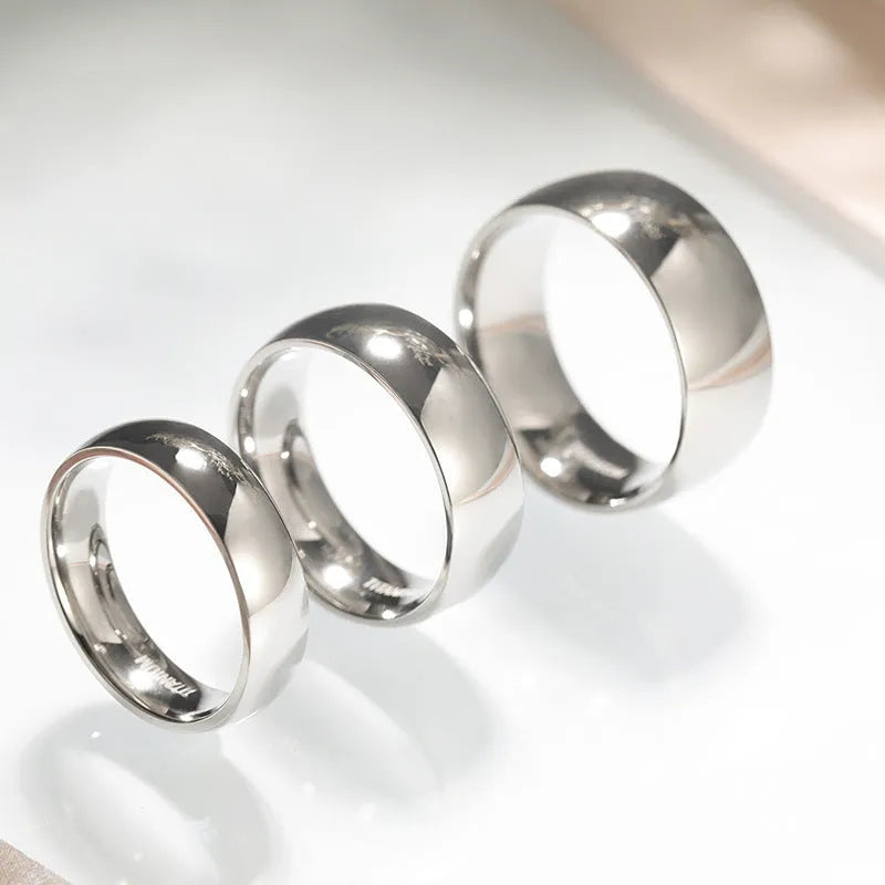 Titanium steel ring in silver colour showing 2mm, 4mm, 6mm, and 8mm width options
