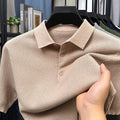 Loose fitting short sleeve cotton sweater in a neutral colour, showing pullover style and casual fit.
