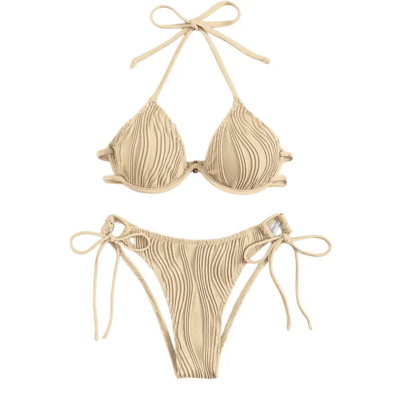 Women's apricot coloured underwire bikini swimsuit with adjustable side-tie bottoms on a mannequin.