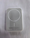 White magnetic wireless power bank with stand functionality showing 5000mAh capacity