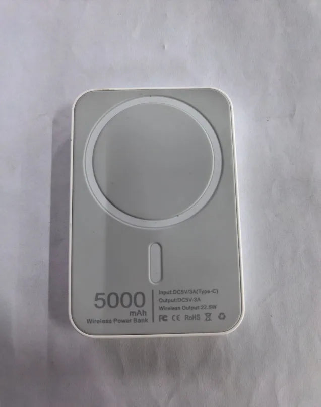 White magnetic wireless power bank with stand functionality showing 5000mAh capacity