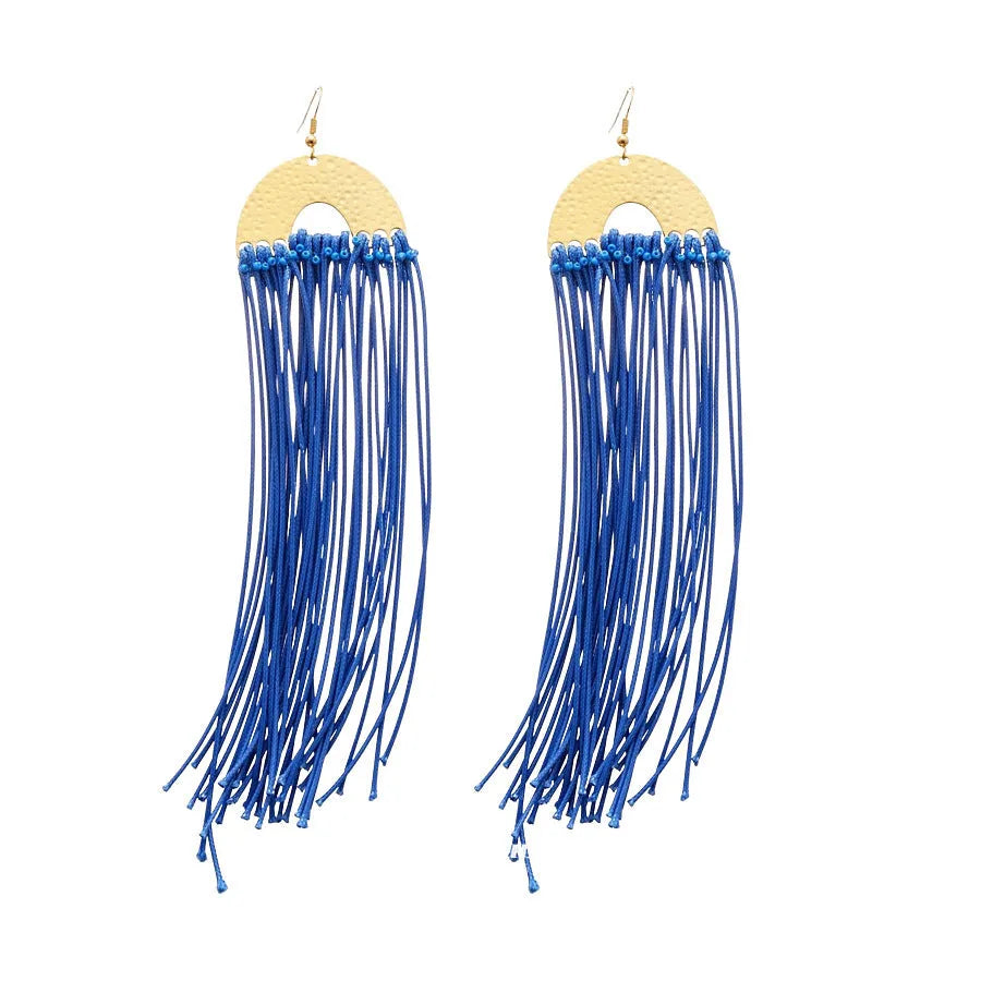 Women's geometric earrings with blue resin flowers on cloth material featuring silver needle elements