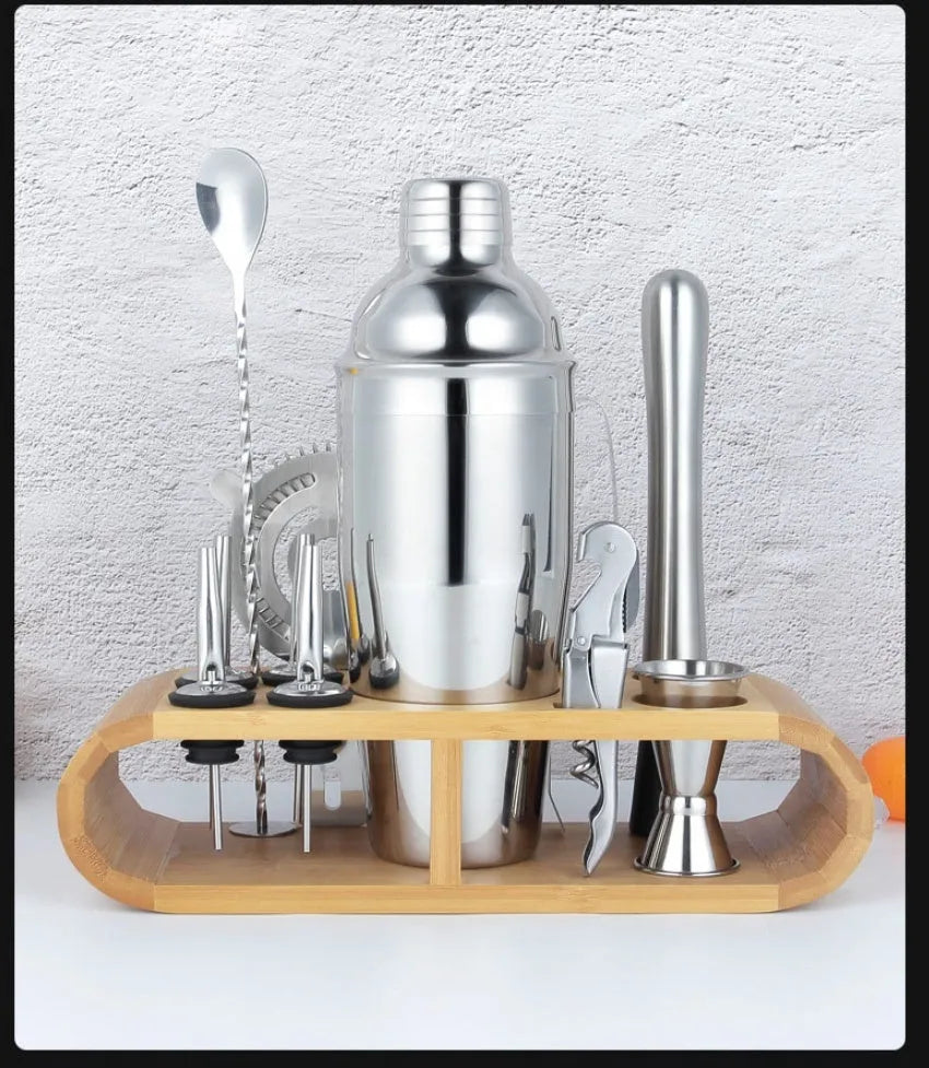 23-piece European style cocktail set with stainless steel bar tools arranged on acrylic display