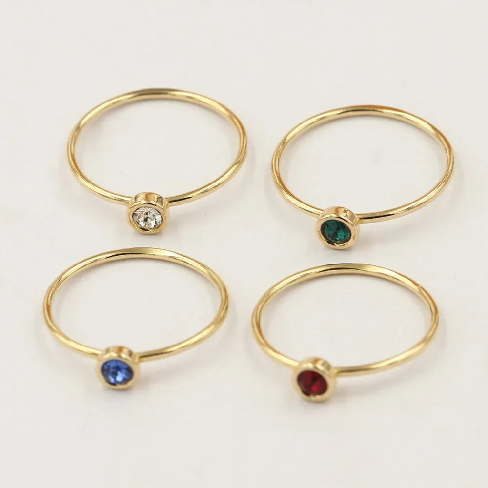Women's knuckle ring with 14K gilded finish and zircon stone in choice of four colours