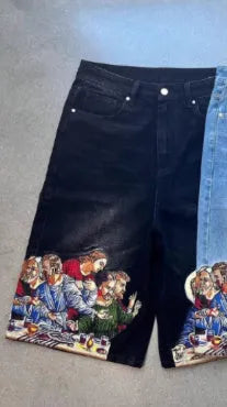Men's blue cotton shorts with Jesus printed design on back pocket showing tapered fit