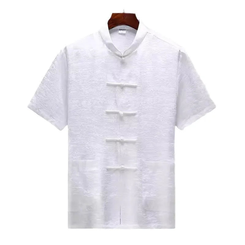 Men's mulberry silk Chinese Tang suit in light green, shown with traditional woven detailing.