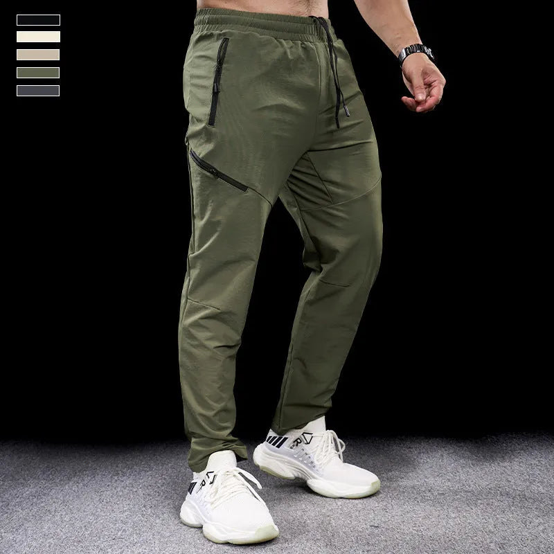 Men's waterproof quick-drying workout trousers in nylon fabric available in multiple colours and sizes