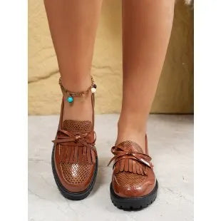 Women's black and brown bow loafers in artificial PU material with slip-on design for spring and autumn wear