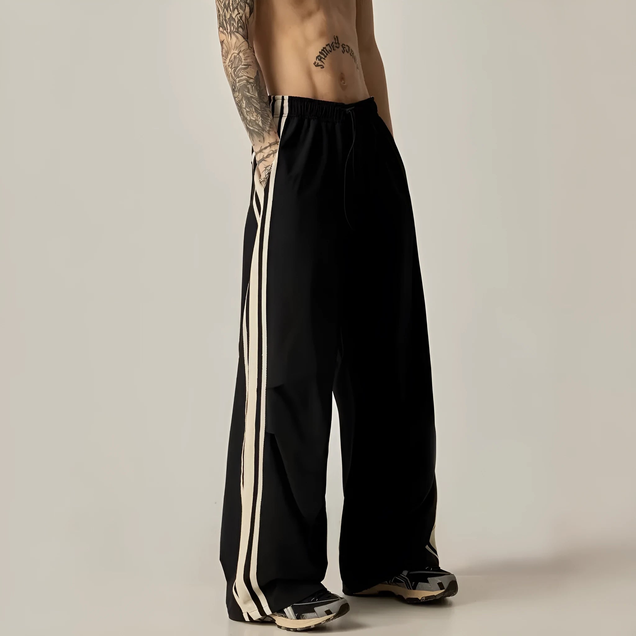 Black wide leg climbing trousers with high-waist design and straight leg cut for men
