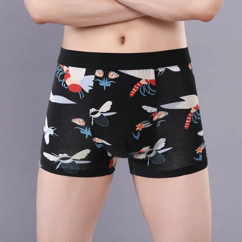 Men's cotton boxer shorts in a floral pattern, showing the mid-waist fit and U-shaped convex design.