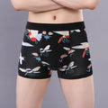 Men's cotton boxer shorts in a floral pattern, showing the mid-waist fit and U-shaped convex design.