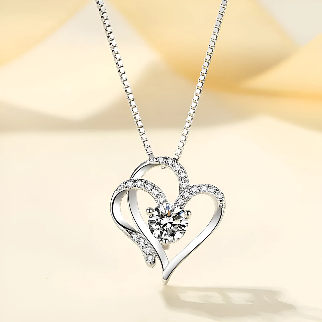 Simple heart-shaped women's necklace in 925 silver with choice of rose gold, platinum, or yellow gold plating.