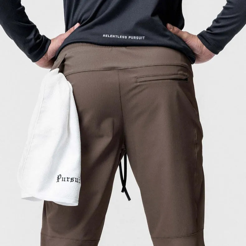Men's quick-dry ankle-tied fitness pants in woodland camouflage colour with loose fit design