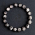 Natural crater ball bracelet featuring gold obsidian and silver stone meteorite beads in various sizes from 9mm to 16mm