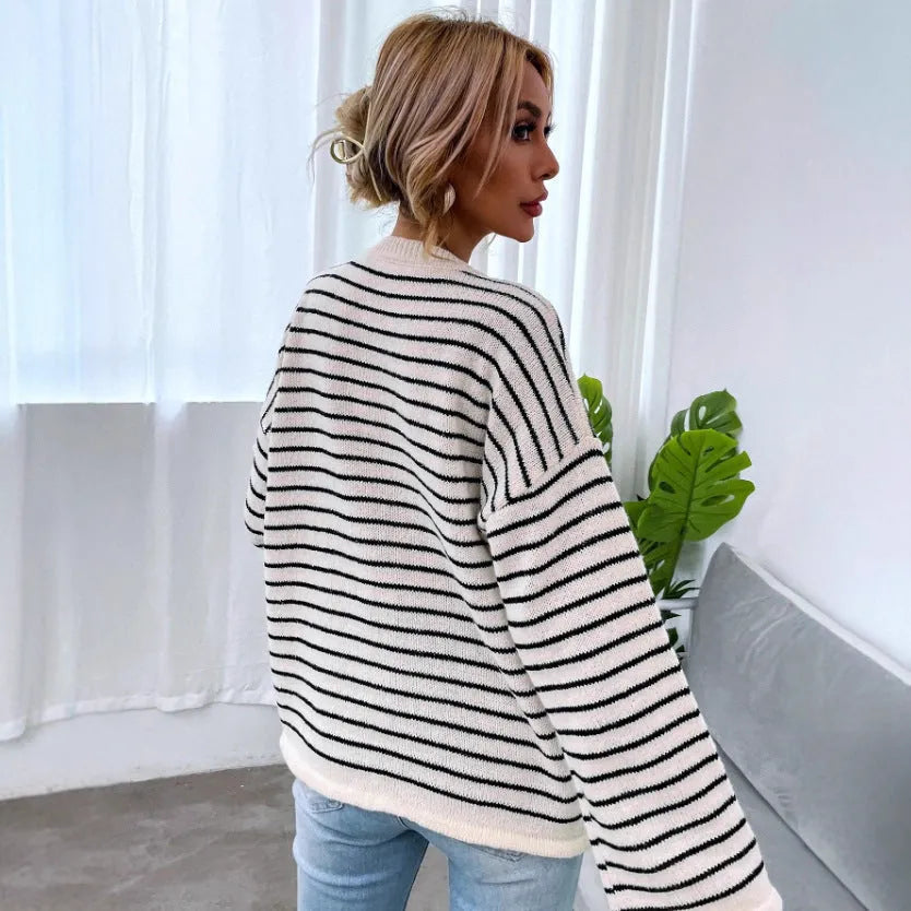 Black striped women's loose top with drop-shoulder sleeves and button detail