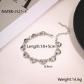 Women's hollowed-out heart bracelet in gold finish with geometric design and stainless steel construction