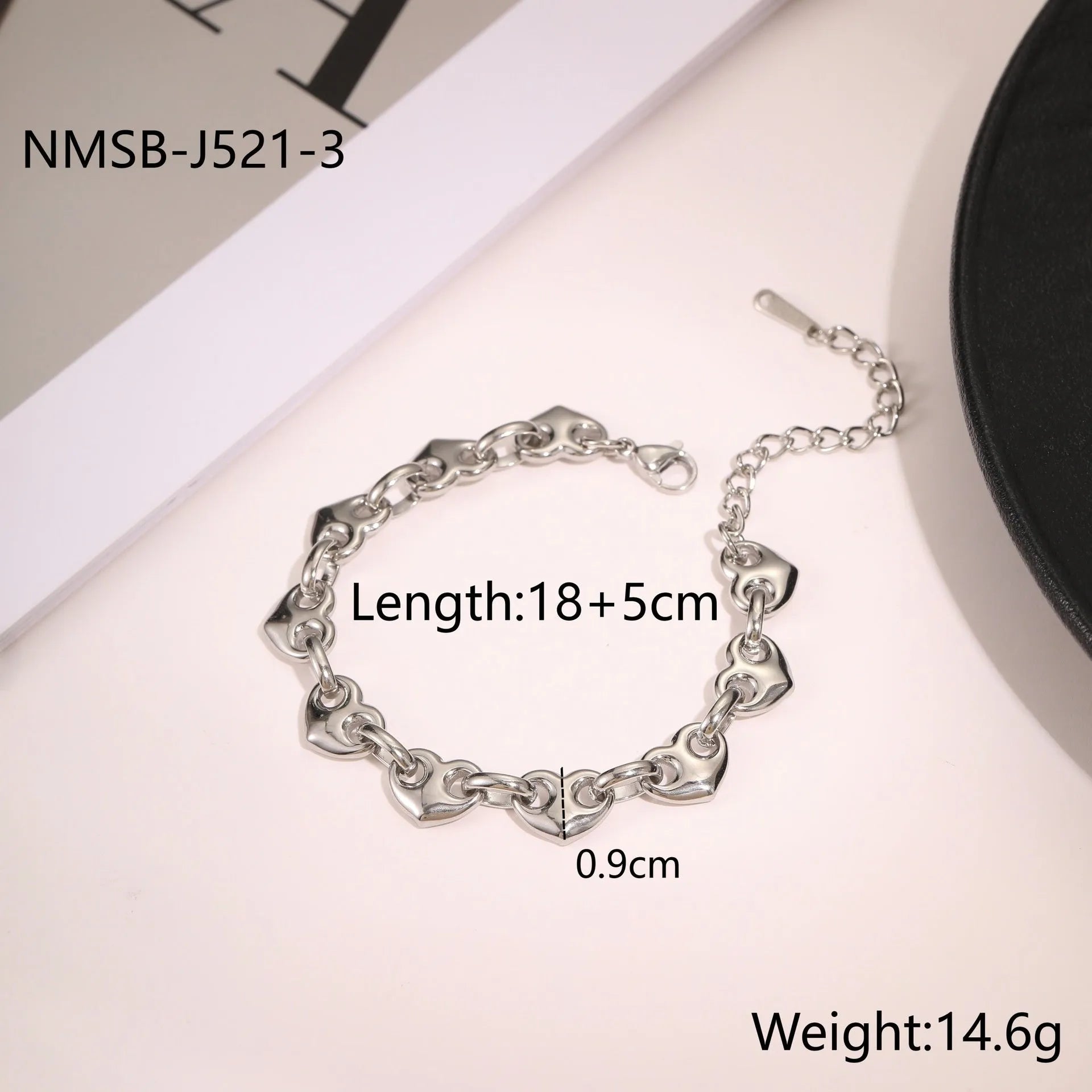 Women's hollowed-out heart bracelet in gold finish with geometric design and stainless steel construction